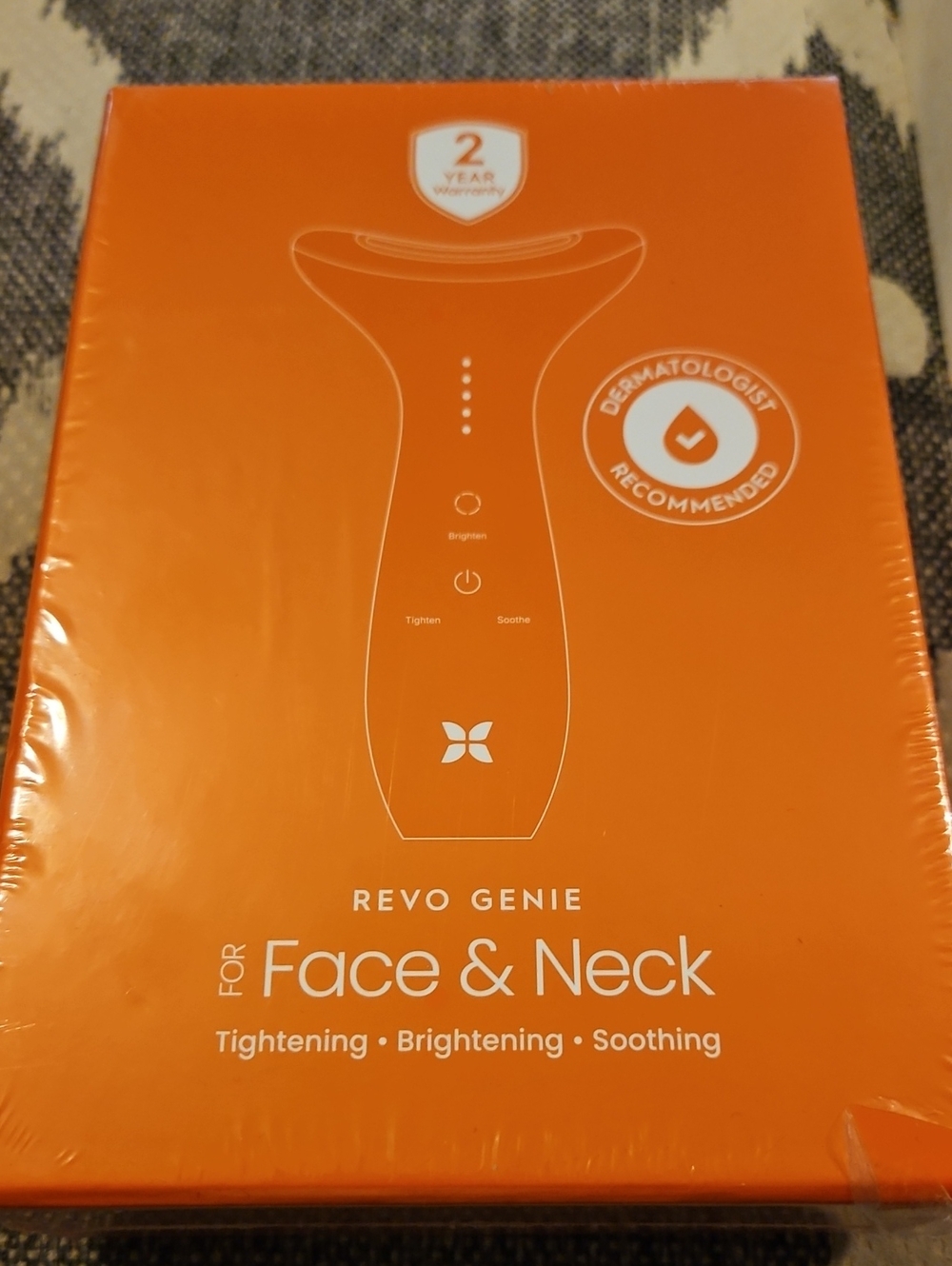 Revo Genie Face & Neck Tightening Device - Orange